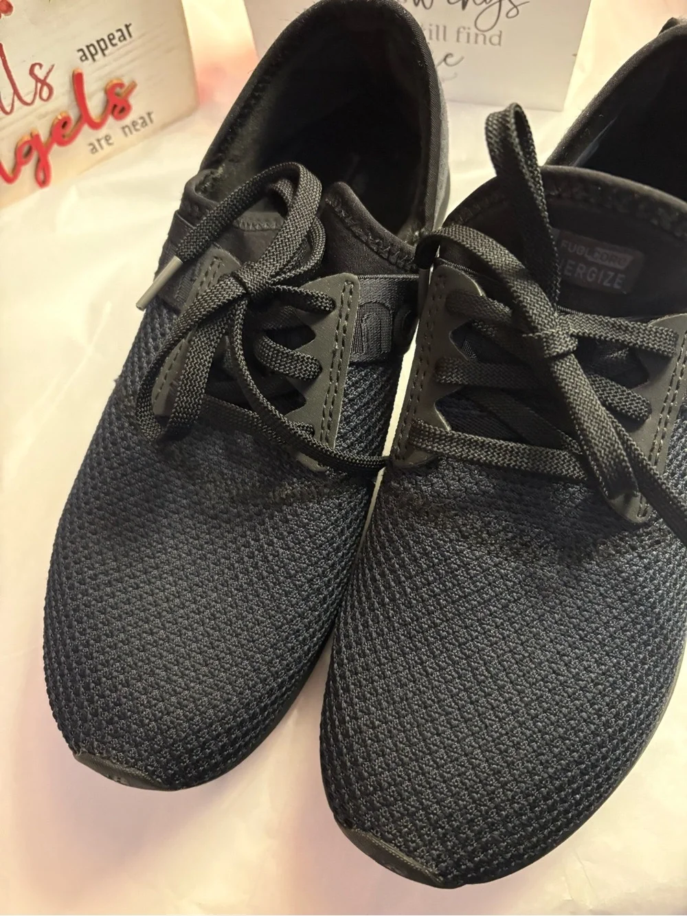 New Balance Woman’s Black Slip-On Knit Sneakers